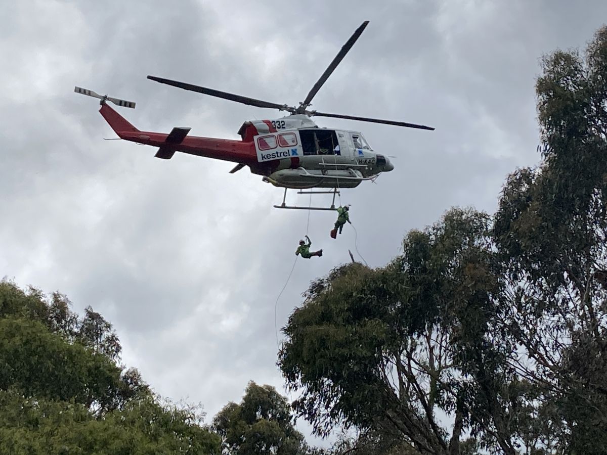 Trainees practice their canopy rappels