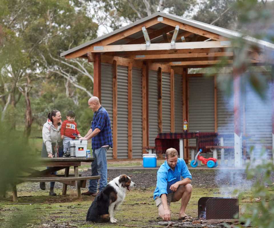 Family enjoying campfire photo