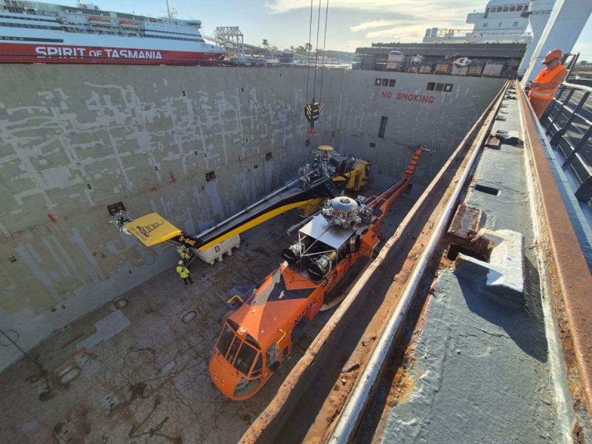 Picture from above of aircranes Marty and Christine positioned side by side in their transport ship