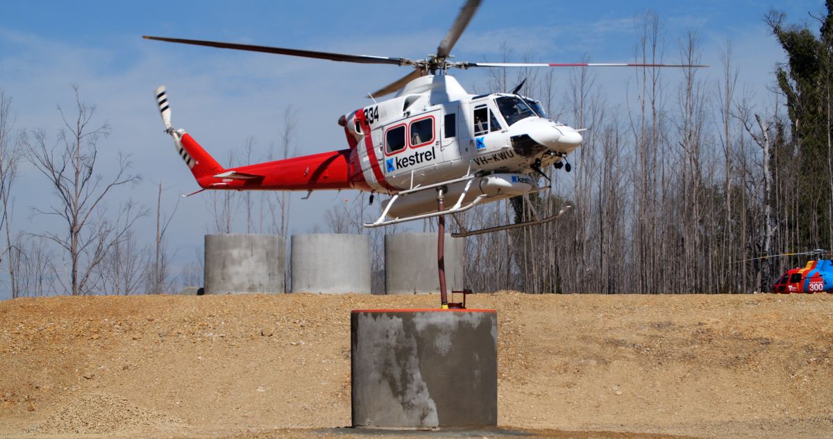 Helicopter refills at on of the new remote water tanks