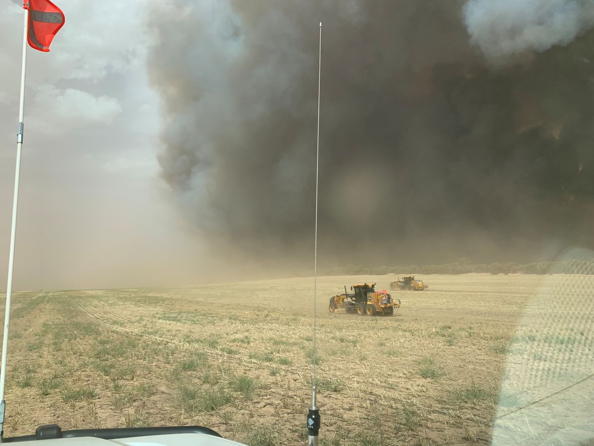 Bulldozers working on fire site