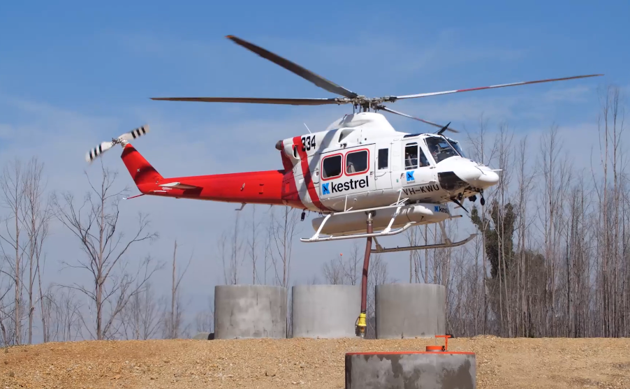 Helicopter above water storage supply 