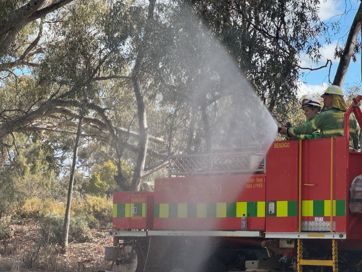 A seasonal firefighter in a heavy tanker